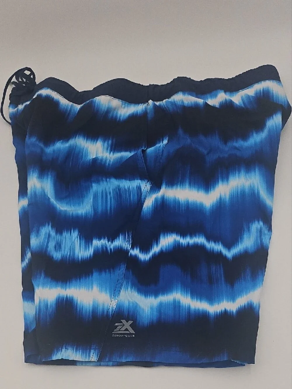 ZeroXposur Men's Blue Wave-Pattern Swim Trunks
